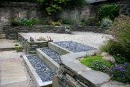 Edinburgh garden designers - note stone dyke walling.
